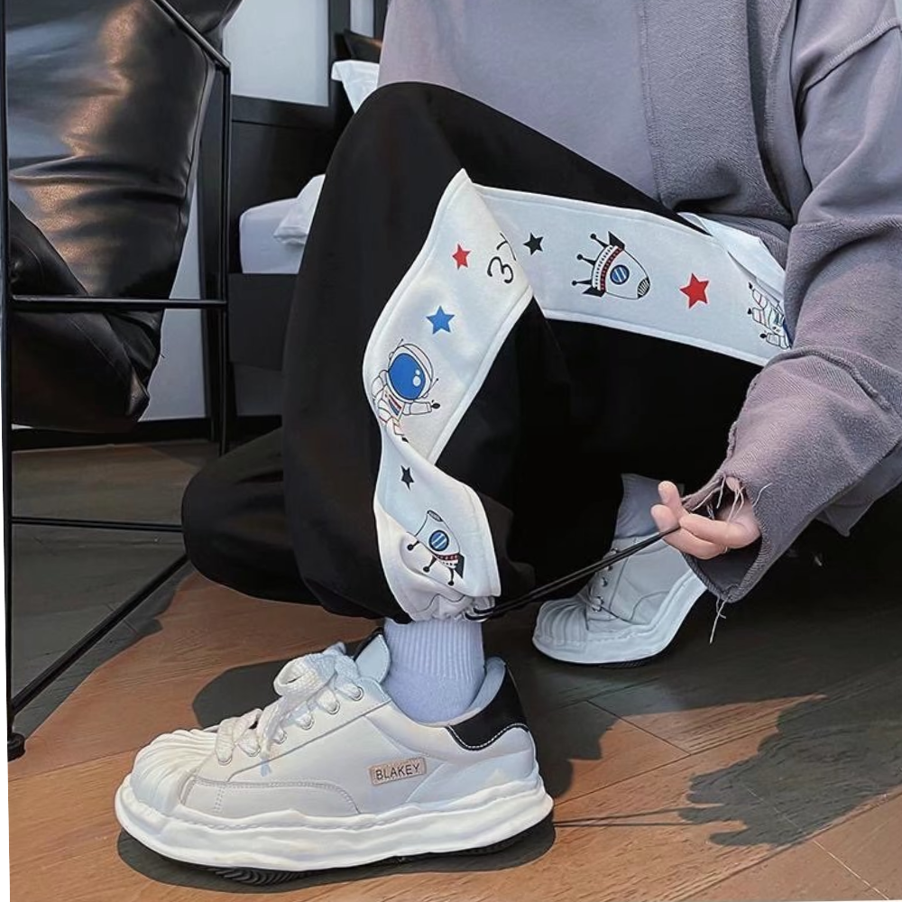 Cosmos Astronaut Print Sweatpants